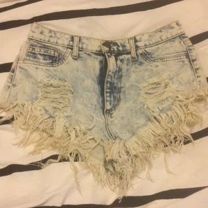 Distressed cheeky shorts